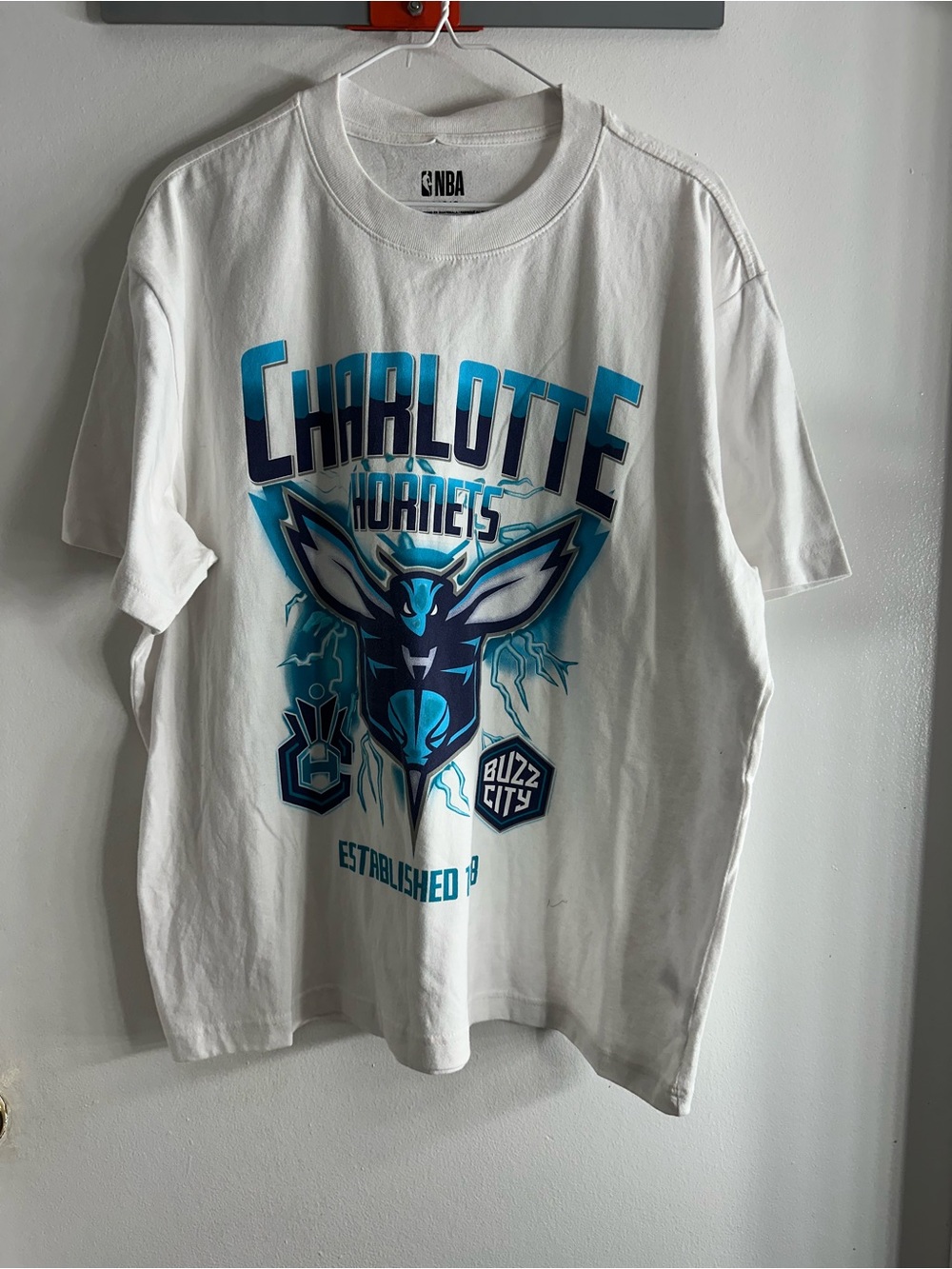 NBA Charlotte Hornets White T-Shirt with Teal and Navy Graphic